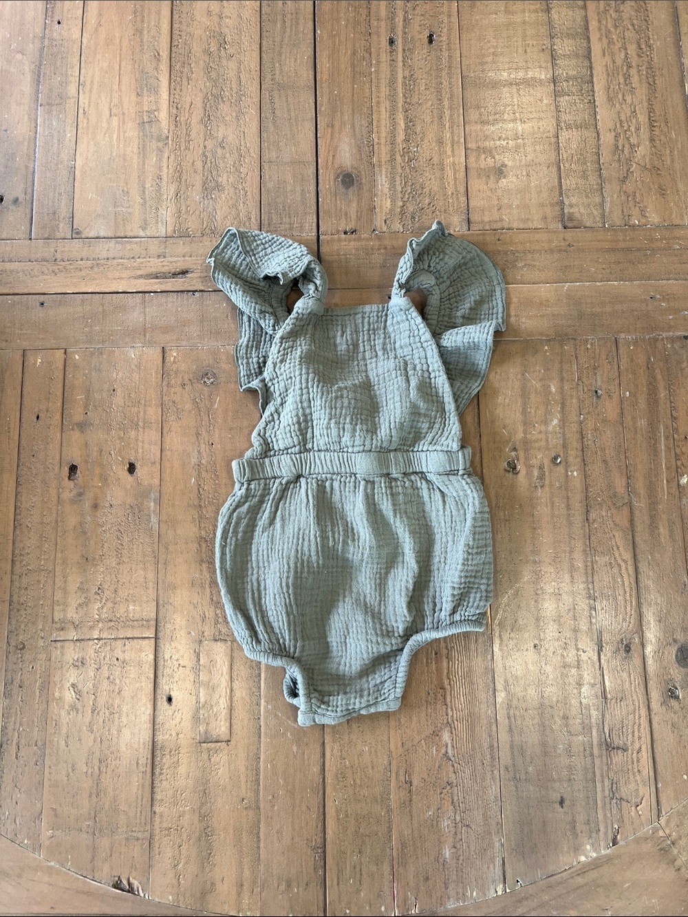 The simple folk green gauzy cotton ruffle strap bubble romper 12-18 months